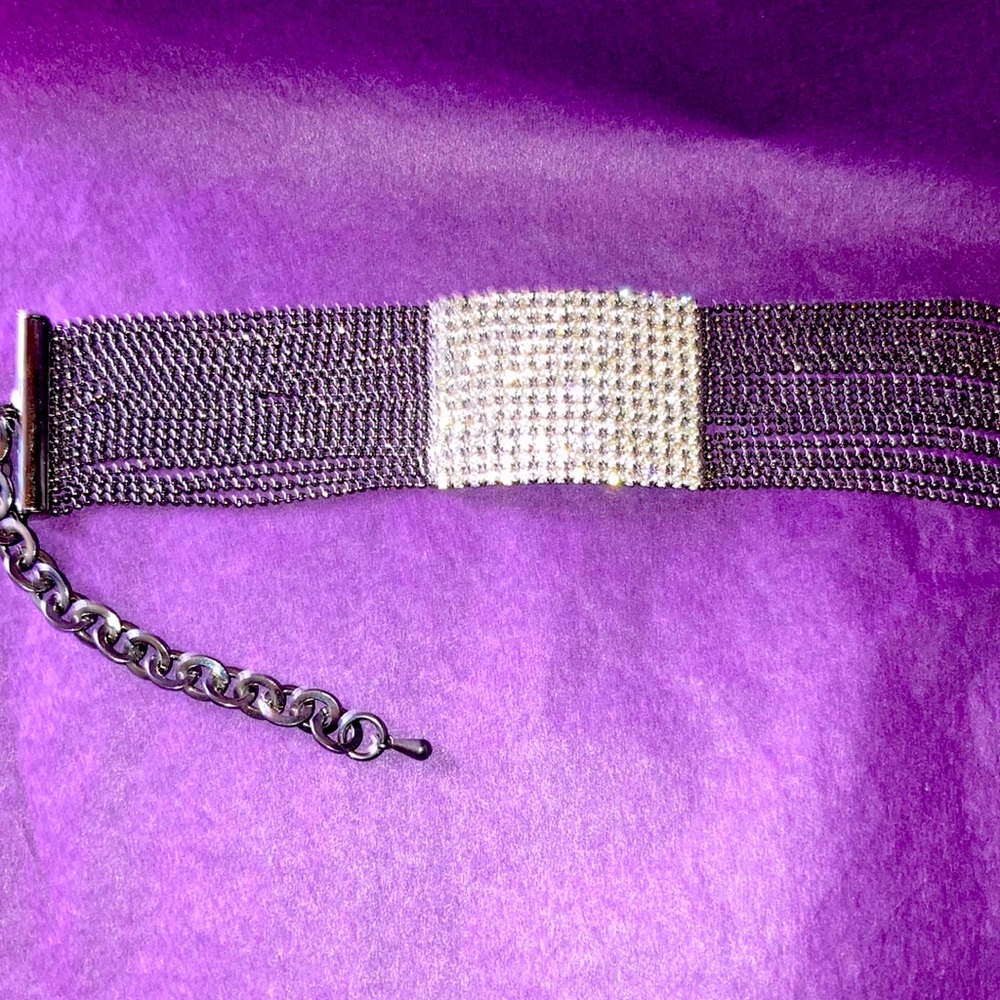 Delicate 19 strand crystal bracelet in gun metal